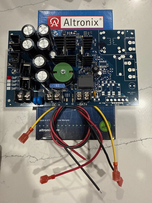 Altronix SMP7 power supply and charger with selectable 6VDC, 12VDC, or 24VDC output and 6-amp capacity, providing reliable power for access control, fire alarm, and security systems.